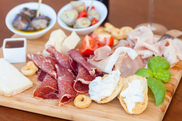 Italian food on chopping board