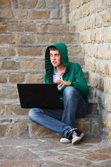 Young man with laptop