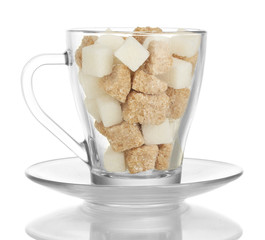 white refined sugar and Lump brown cane sugar cubes in glass