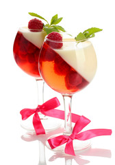 fruit jelly in glasses with raspberries and mint isolated