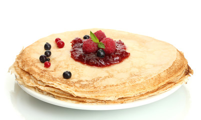 Delicious pancakes with berries and jam