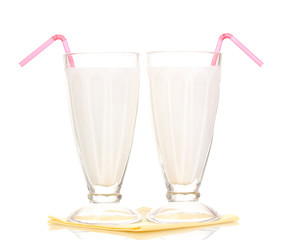 Vanilla milk shakes isolated on white