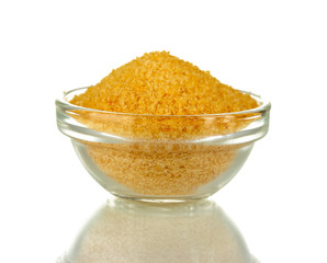 Crystals of gelatin in a bowl isolated on white close-up