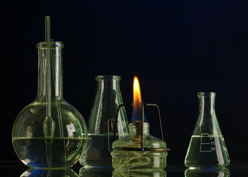 spiritlamp and test-tubes on blue background