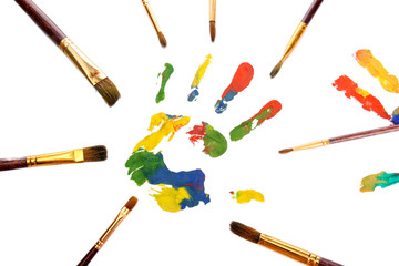 Color hand print with brushes, isolated on white