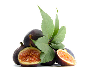 Ripe sweet figs with leaves isolated on white