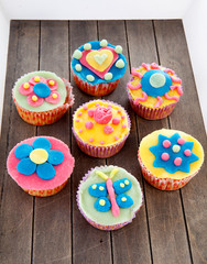 Couple of cupcakes with marzipan decoration