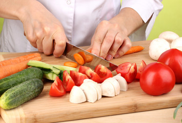 Obraz na płótnie Canvas Chopping food ingredients