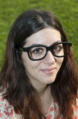 girl with big glasses at the park
