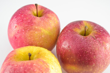 Fresh red apples isolated over white background