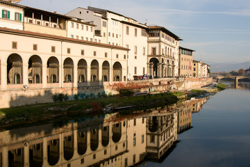 Fototapeta premium Florence, view over Arno River from Ponte Vecchio.