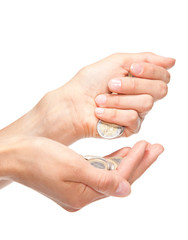 Closeup of human hands counting coins