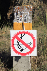 No smoking. Signs on pillar