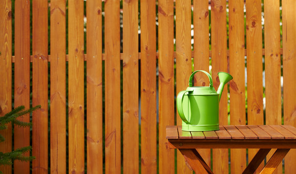 Garden tools on the wooden background