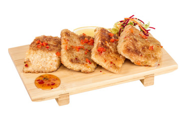 Fried fish fillets with  salad.
