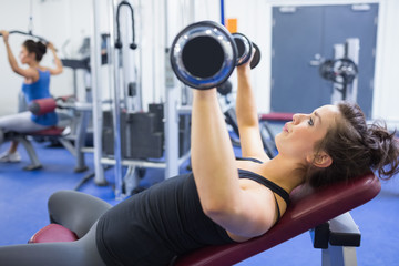 Woman lifitng weights