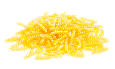 pile of fusilli pasta close up on wood background