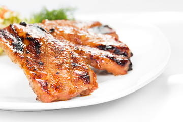 barbecue with sauce and vegetables