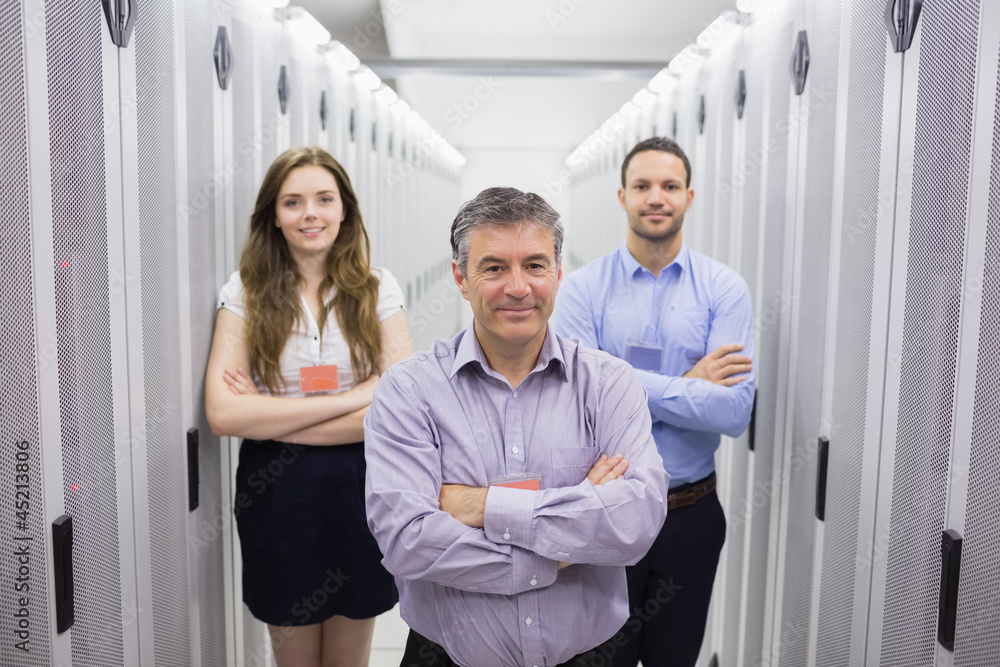 Aufkleber three smiling people standing in data center