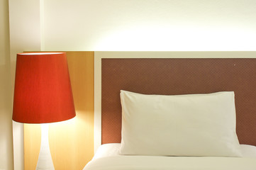 Pillow and Bed in a hotel room at night