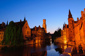 Fototapeta premium View from the Rozenhoedkaai at the Old Town of Bruges at dusk
