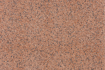 Red pebble stone tile surface background.
