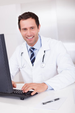 Smiling Medical Doctor With Stethoscope