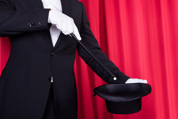 A Magician In A Black Suit