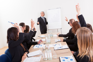Businessman Raising His Hand