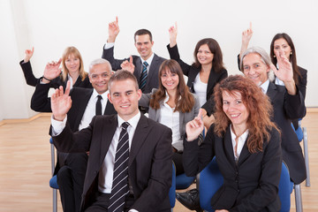 Business People Raising Their Hand