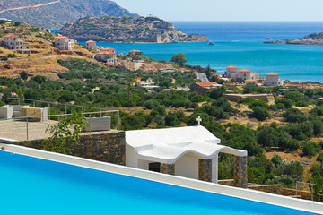 Blue swimming pool at Mirabello Bay in Greece