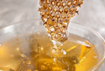 Glass honey pot and honey comb