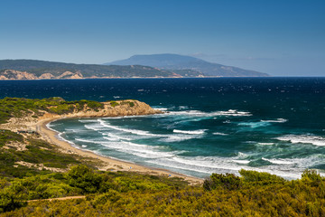 Fototapeta na wymiar Greek bay with a sand beach