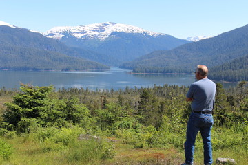 Fototapeta na wymiar Senior Man in Alaska Wilderness Landscape