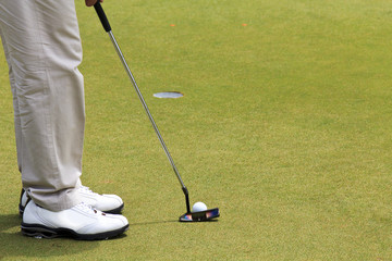 male golfer setup for his putting