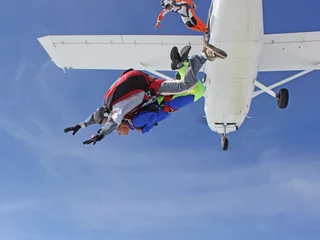 Rolgordijnen Tandem parachutesprong (vliegtuiguitgang) © Didier Doceux