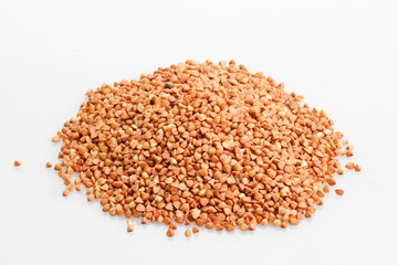 Buckwheat on white background.