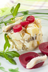 Potato salad with herring and beets