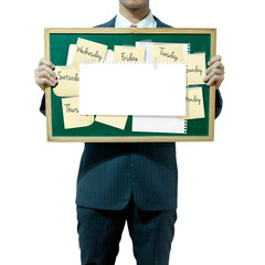 Business man holding board on the background