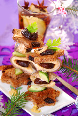 herring canapes with prune and gherkin for christmas