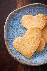 Butter cookies with sugar on a ceramic plate