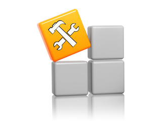 orange cube with service sign on boxes