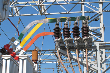 copper bars and insulators of electricity transformers in a elec