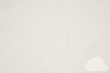 Obraz premium Cloud icon on sand background and textured