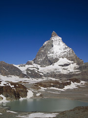 Matterhorn the Switzerland symbol and a cute little lake