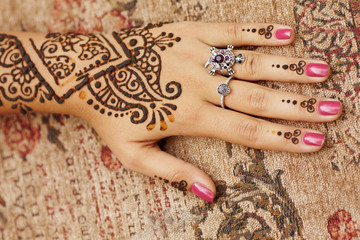 Henna art on woman's hand