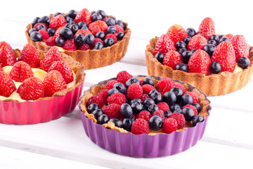 strawberry,blueberry and raspberry tarts