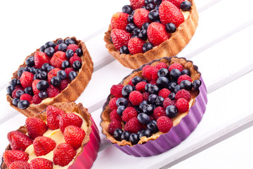strawberry,blueberry and raspberry tarts
