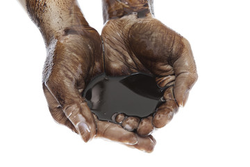 Hands with black oil