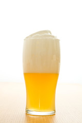 Frosty glass of light beer  